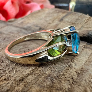 14ky Swiss blue topaz and peridot ring