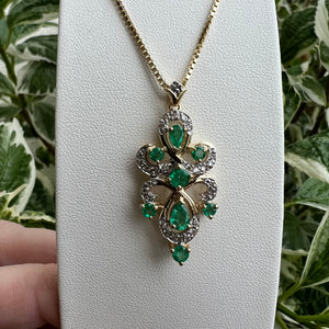 14ky emerald and diamond pendant