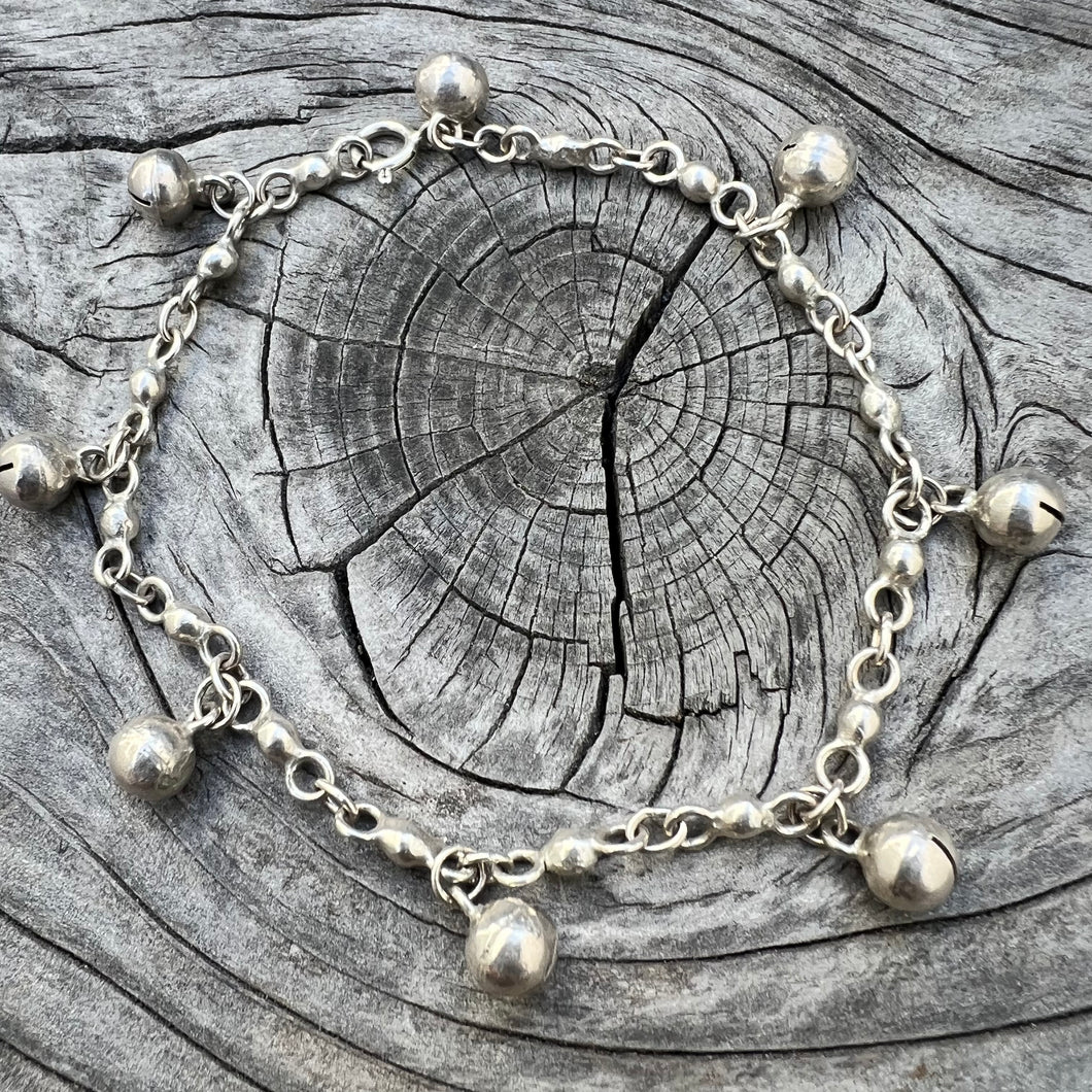 Silver jingle charm bracelet